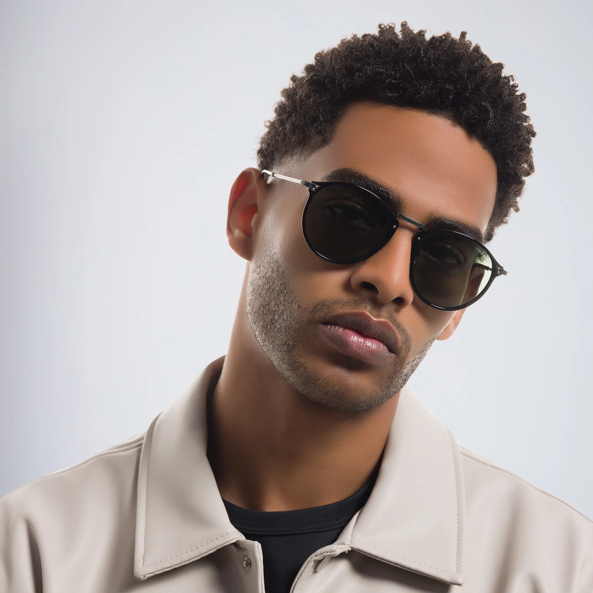 Shop GIORGIO ARMANI Round Sunglasses in Black online.