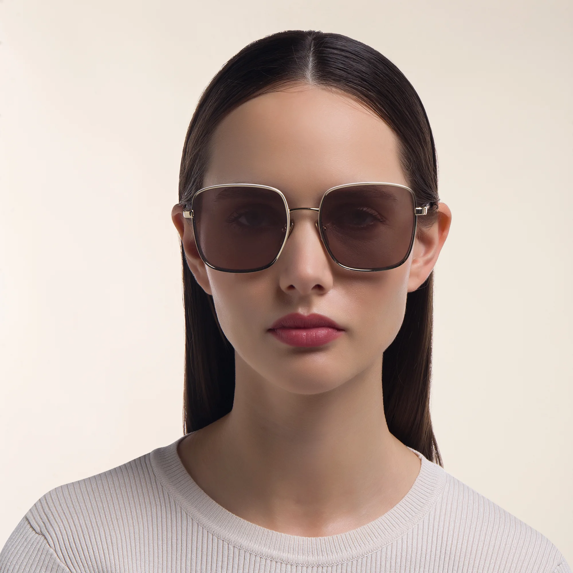 Shop PRADA Oversized Square Sunglasses in Pale Gold online.