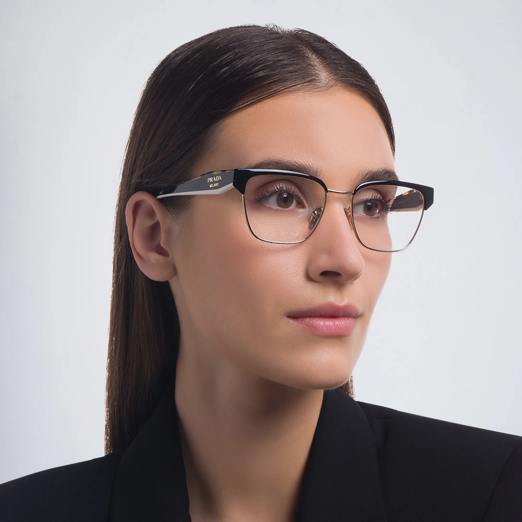 Shop PRADA Irregular Eyeglasses in Black/Pale Gold online.