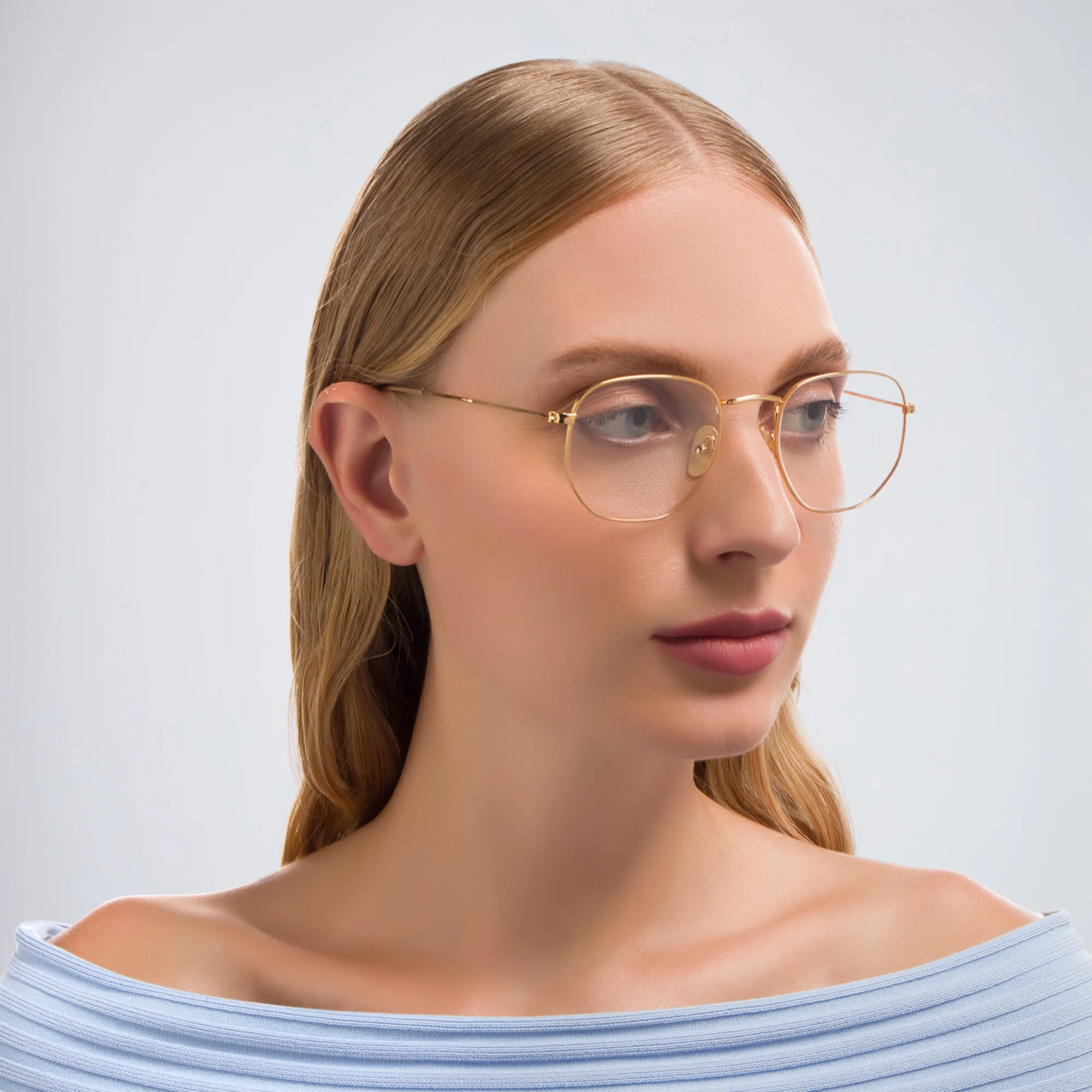 Shop Ray-Ban Hexagonal Unisex Eyeglasses in Polished Gold online.