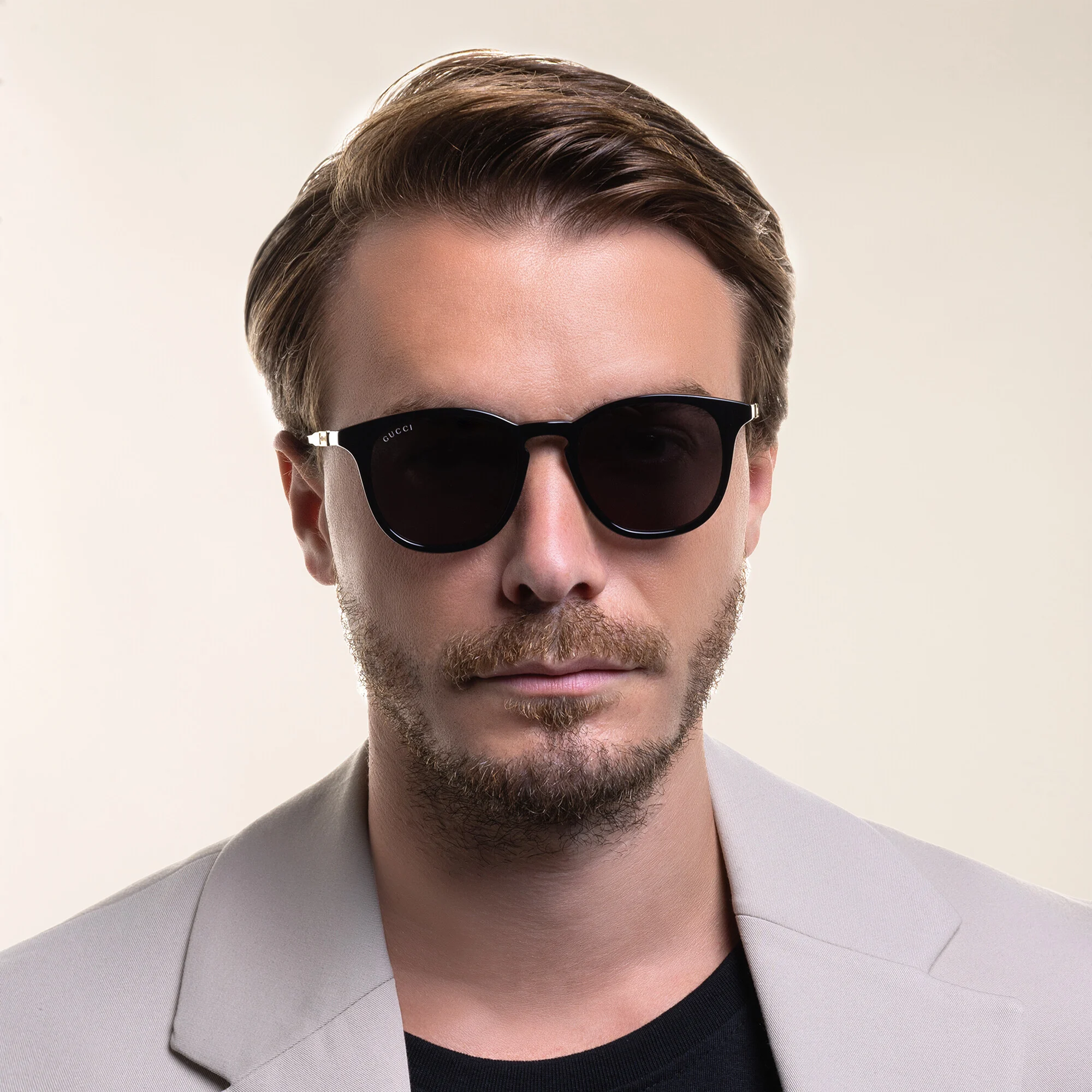 Shop GUCCI Round Sunglasses in Black online.