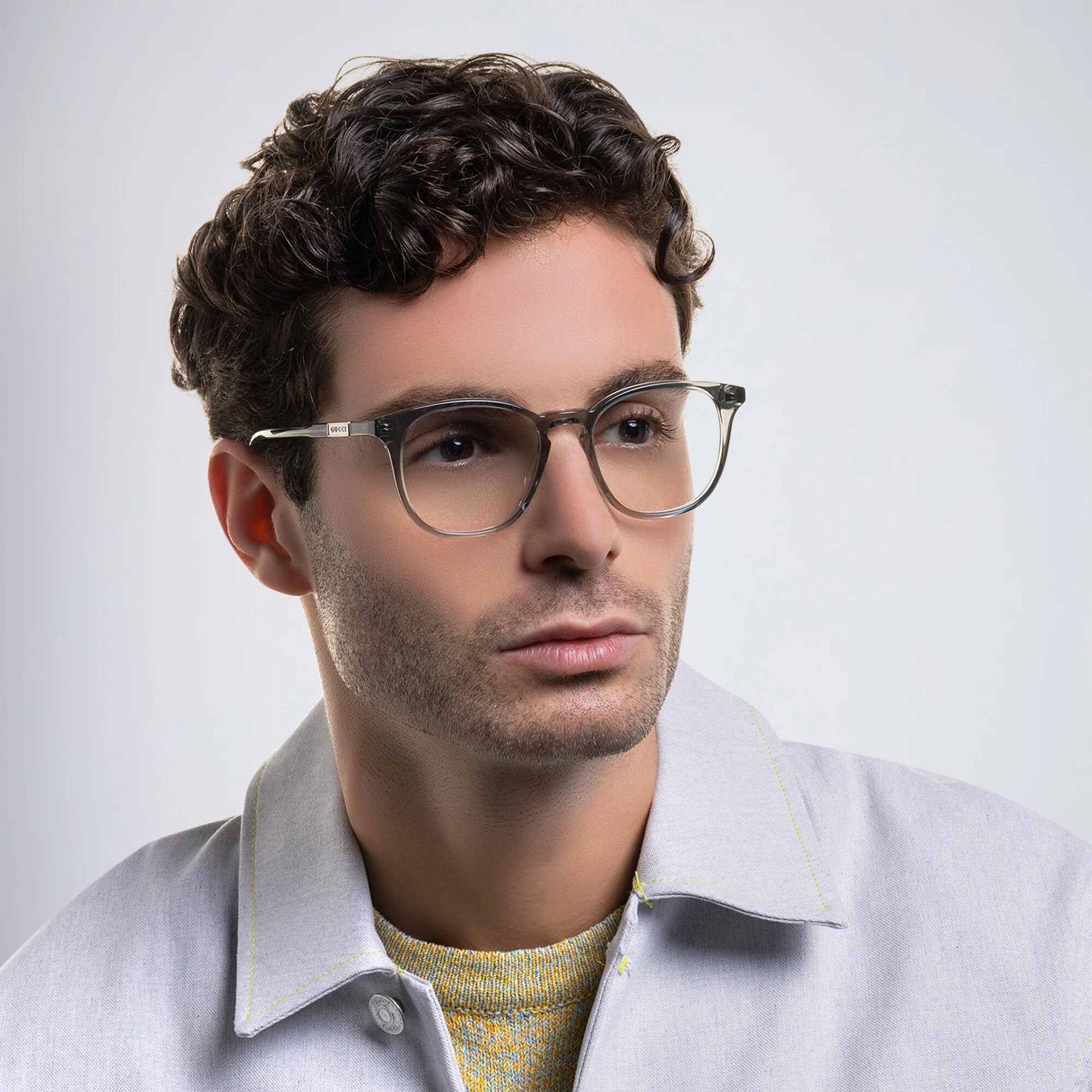 Shop GUCCI Round Eyeglasses in Grey online.