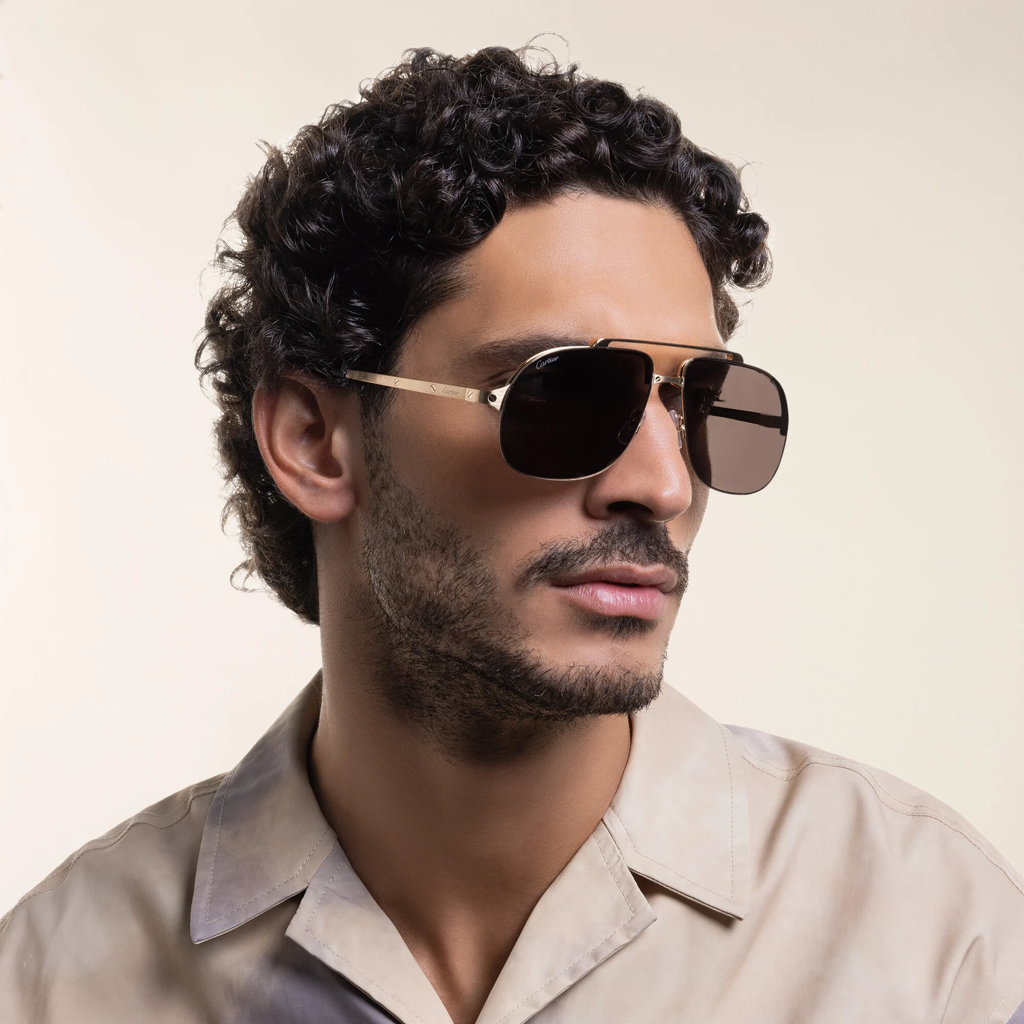 تسوق نظارات شمسية سانتوس دو كارتييه طراز بايلوت كارتييه بلون ذهبي أونلاين.