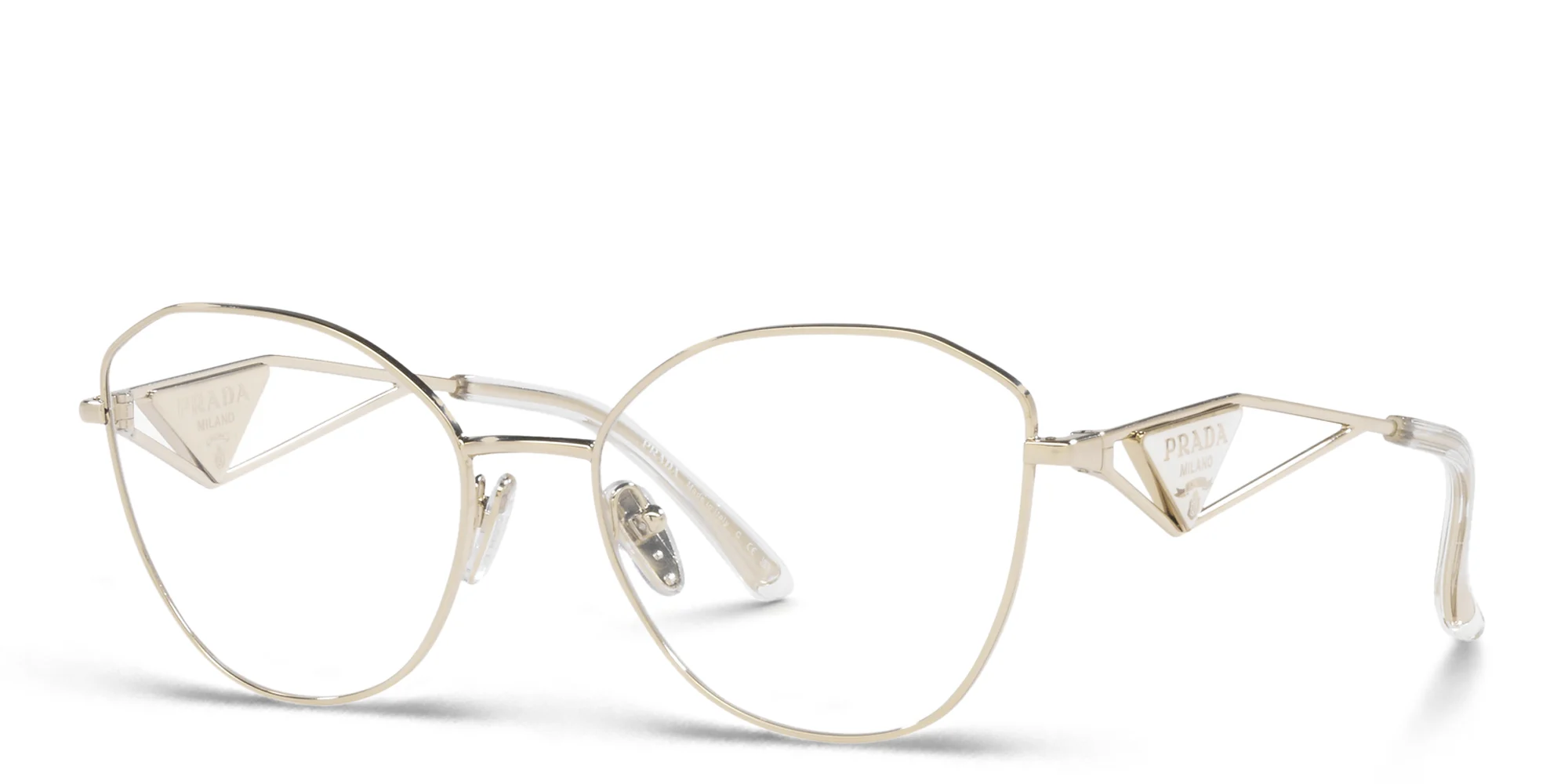 Shop PRADA Irregular Eyeglasses in Pale Gold online.