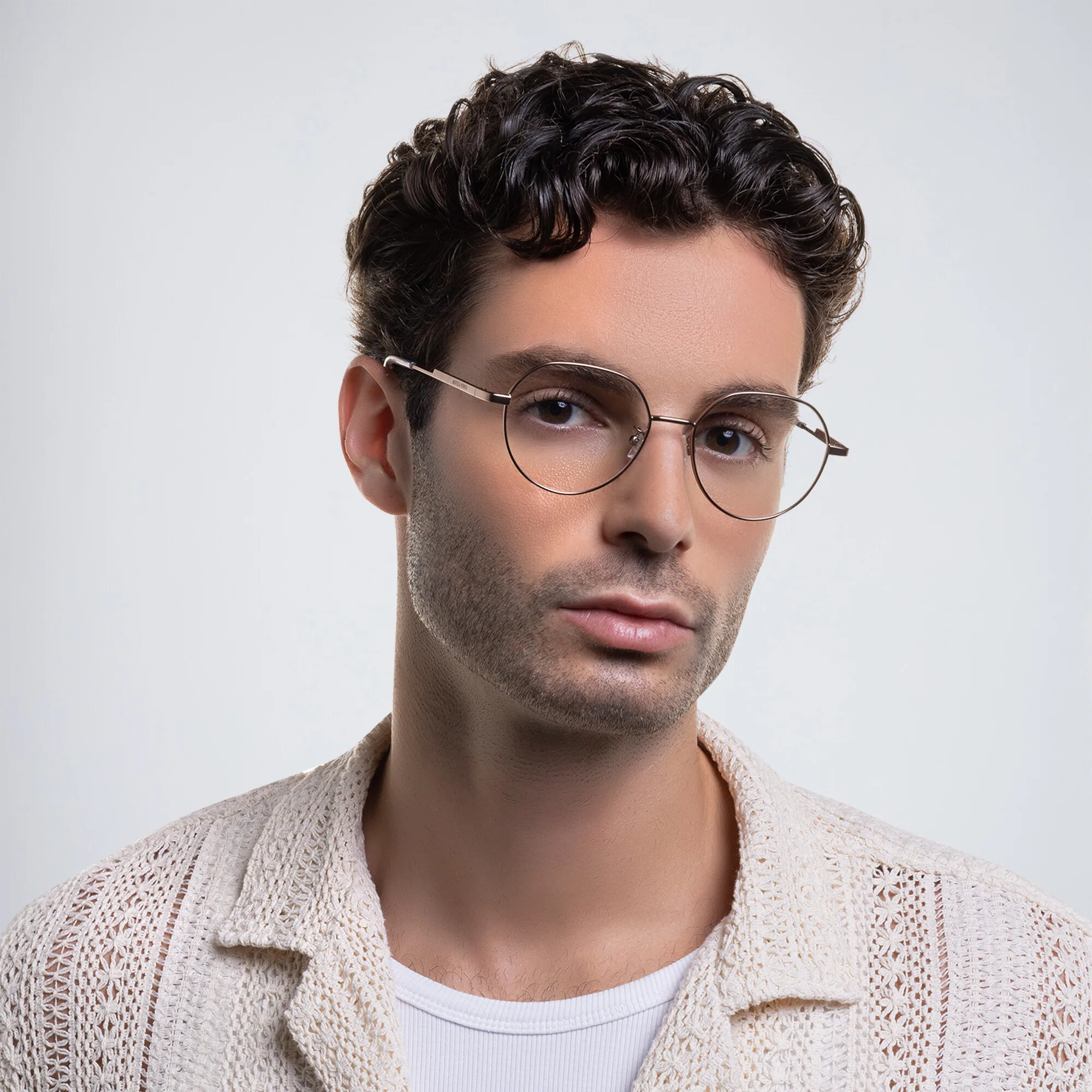 Shop BOTTEGA VENETA Unisex Round Eyeglasses in Gold online.