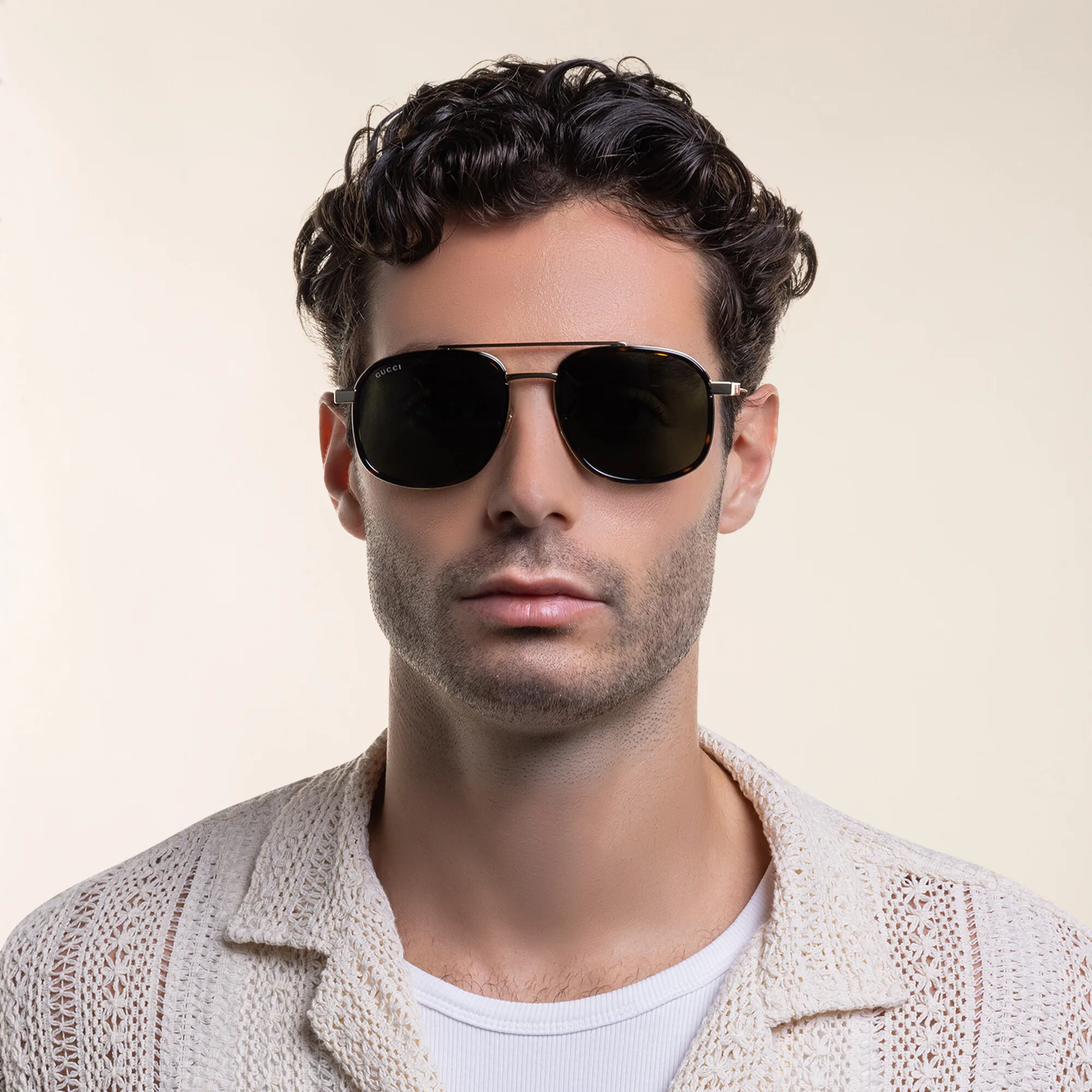 Shop GUCCI Aviator Sunglasses in Gold online.