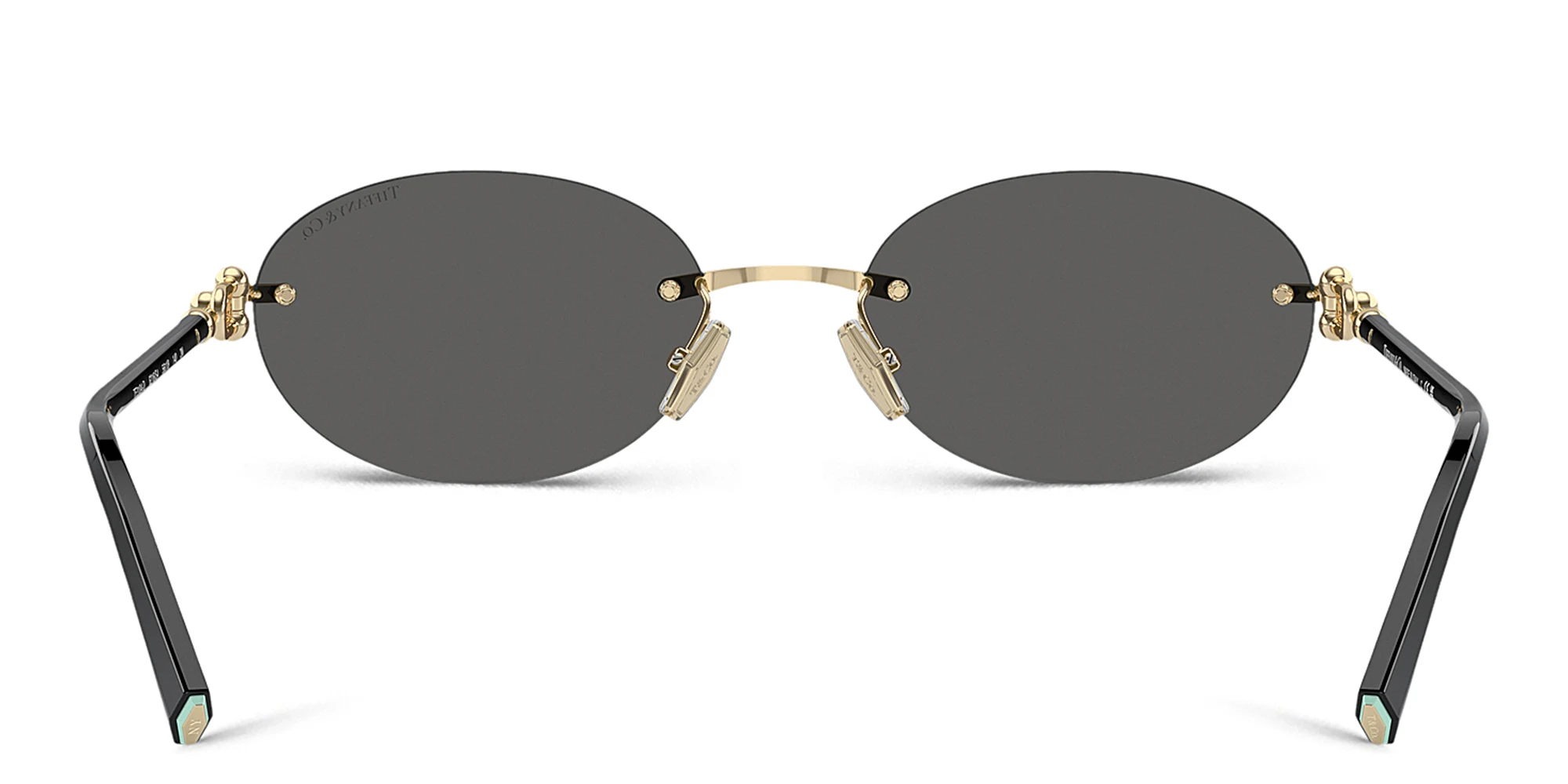 Shop TIFFANY Tiffany HardWear Rimless Oval Sunglasses in Gold online.