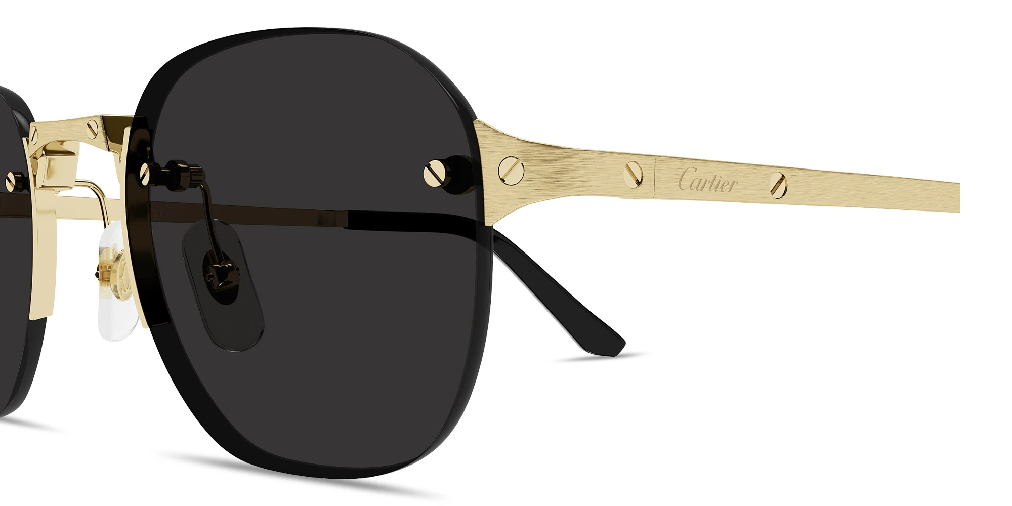 Shop Cartier Santos de Cartier Rimless Round Sunglasses in Gold online.