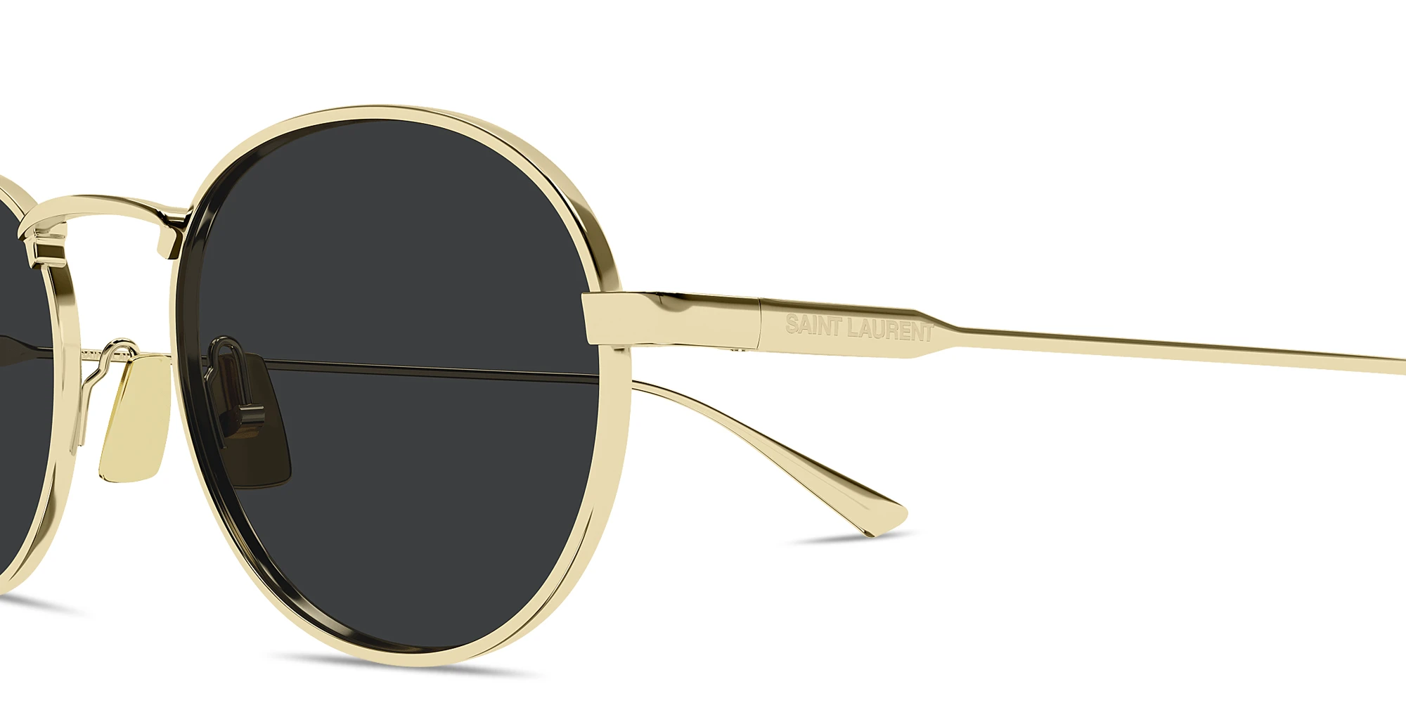Shop SAINT LAURENT Engraved Logo Round Sunglasses in Gold online.