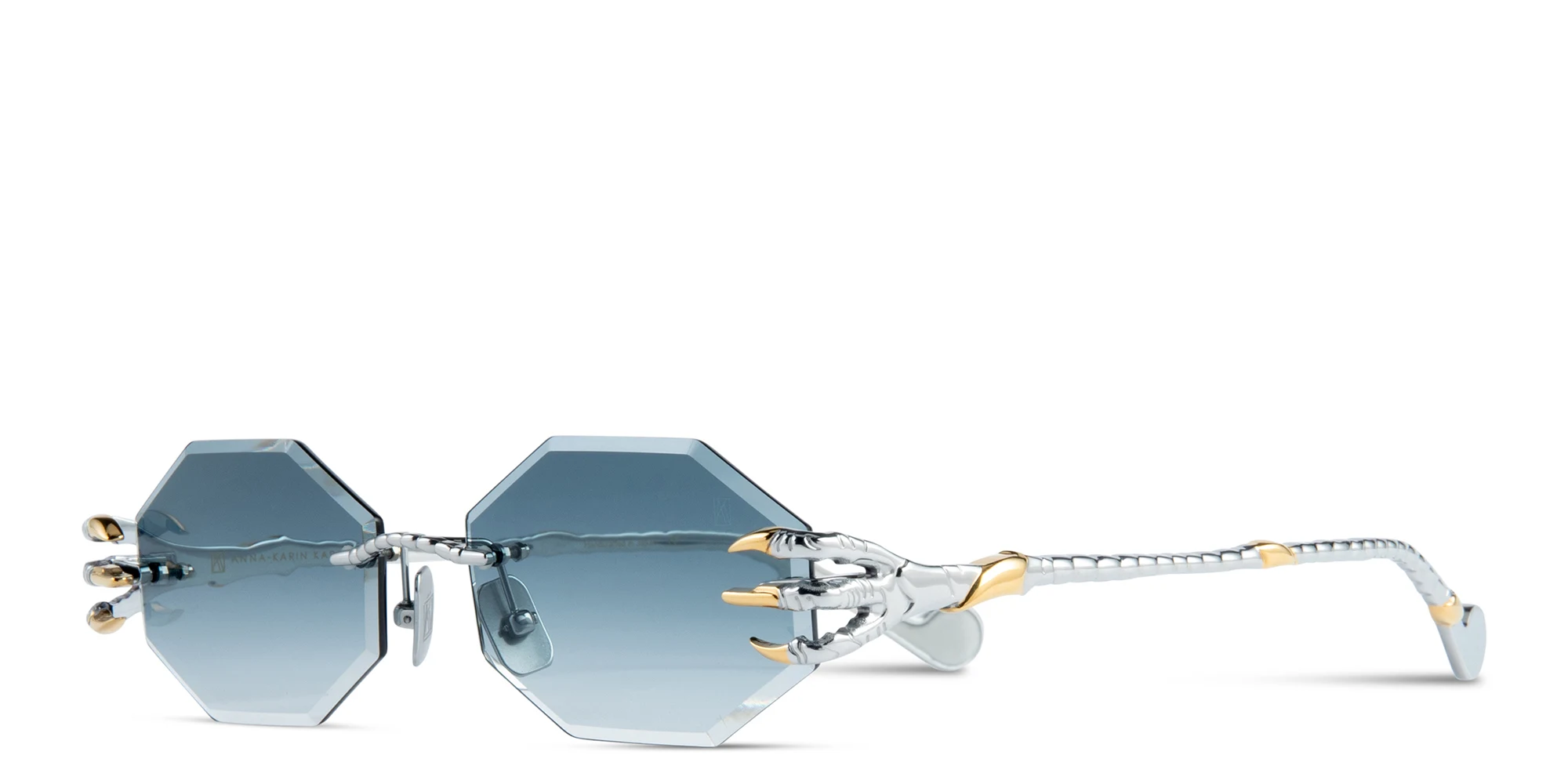 Shop ANNA KARIN KARLSSON The Claw & The Nest Unisex Rimless Irregular Sunglasses in Gold & White online.