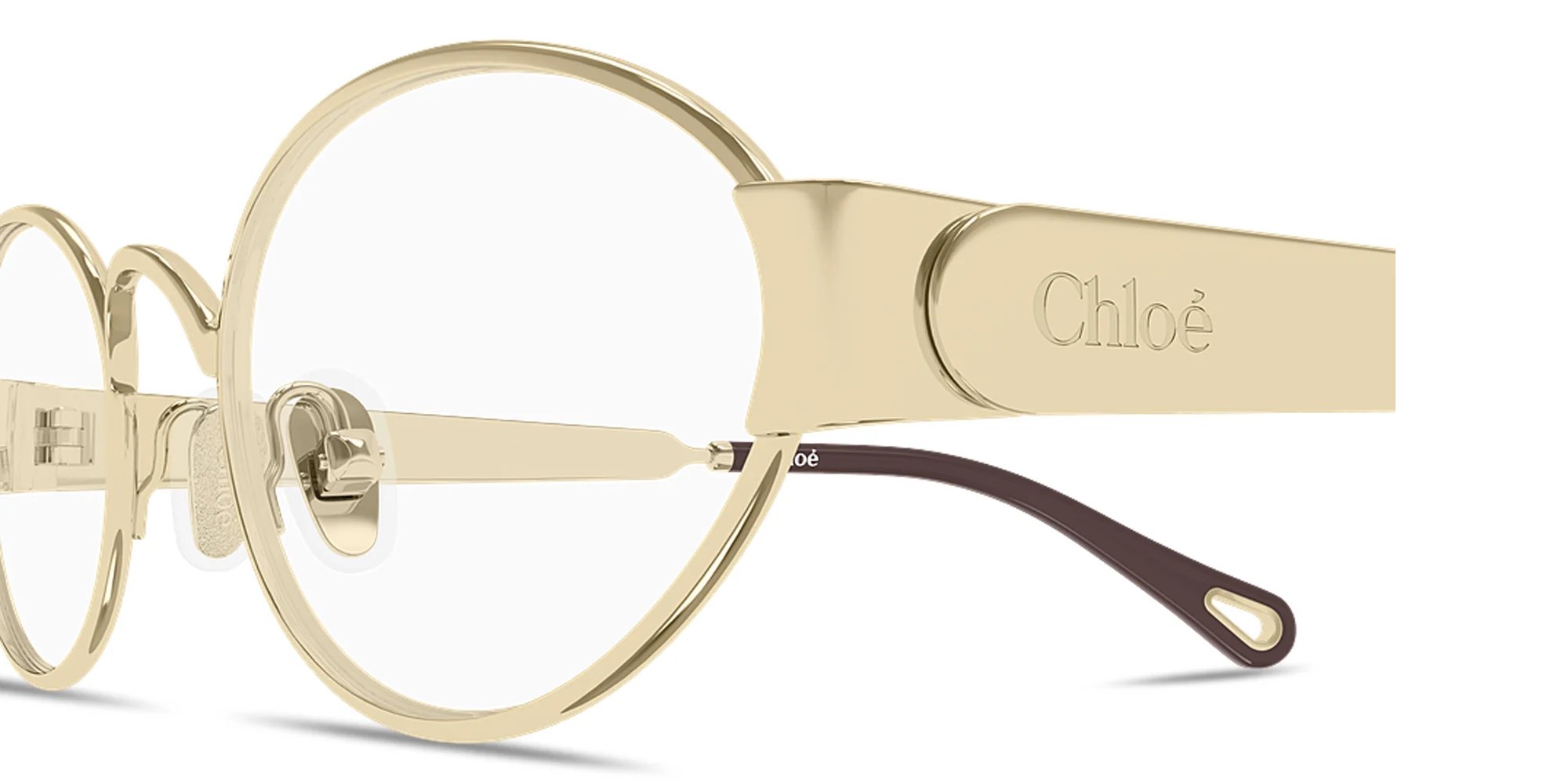 Shop Chloe Holly Oval Eyeglasses in Polished Gold online.