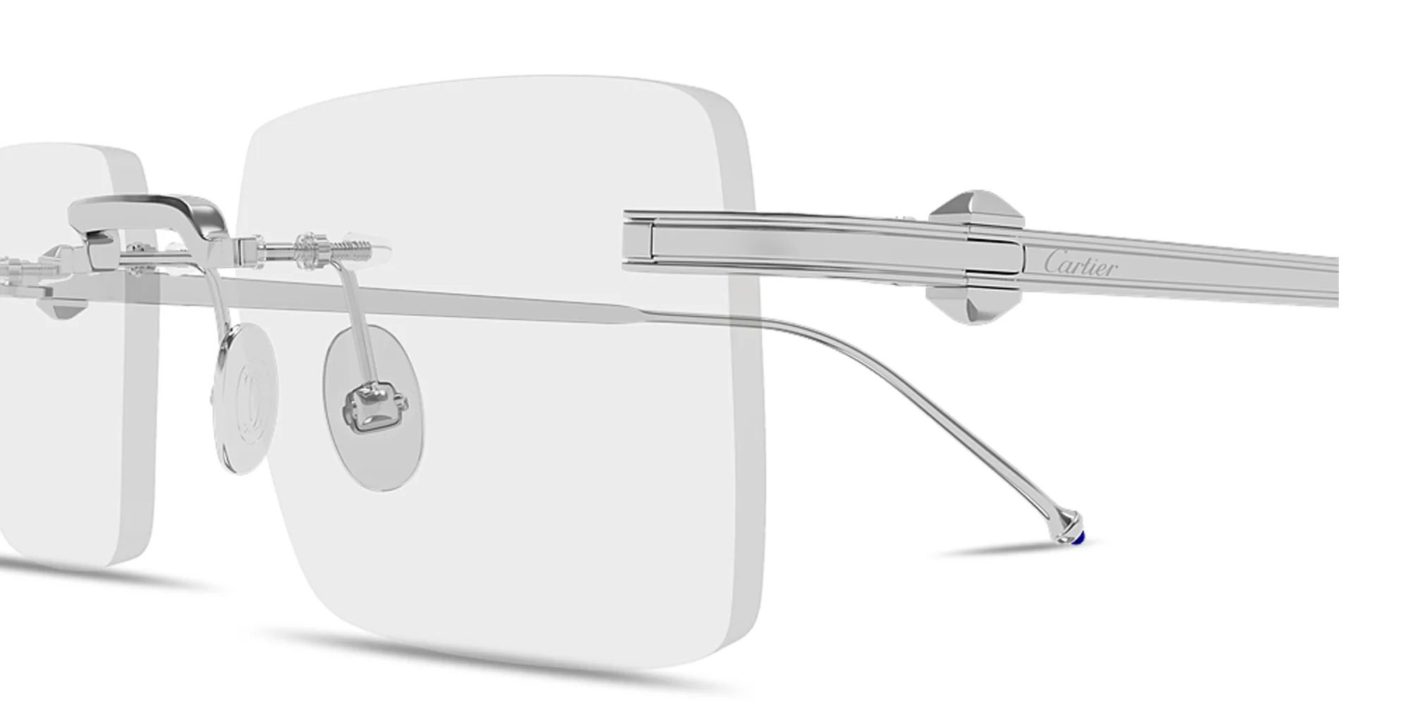 Shop Cartier Pasha Rimless Rectangle Eyeglasses in Silver online.