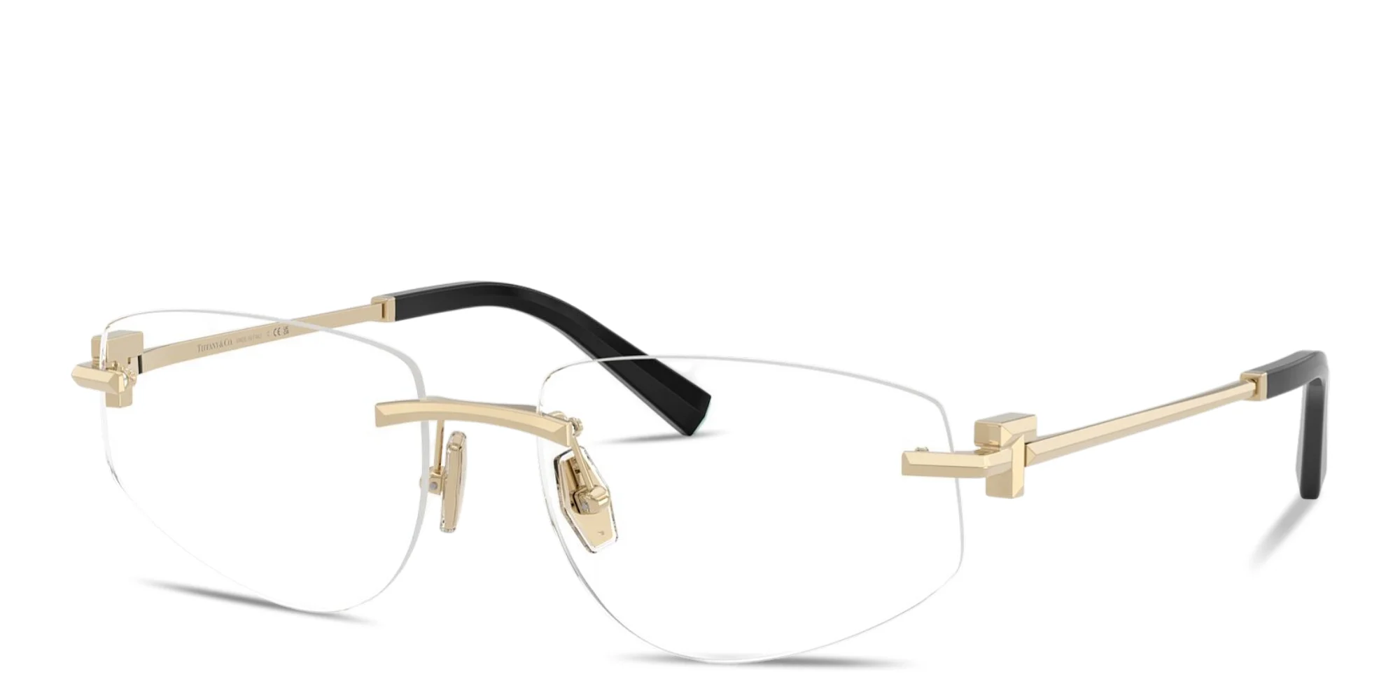 Shop TIFFANY Tiffany T Rimless Wide Irregular Eyeglasses in Pale Gold online.