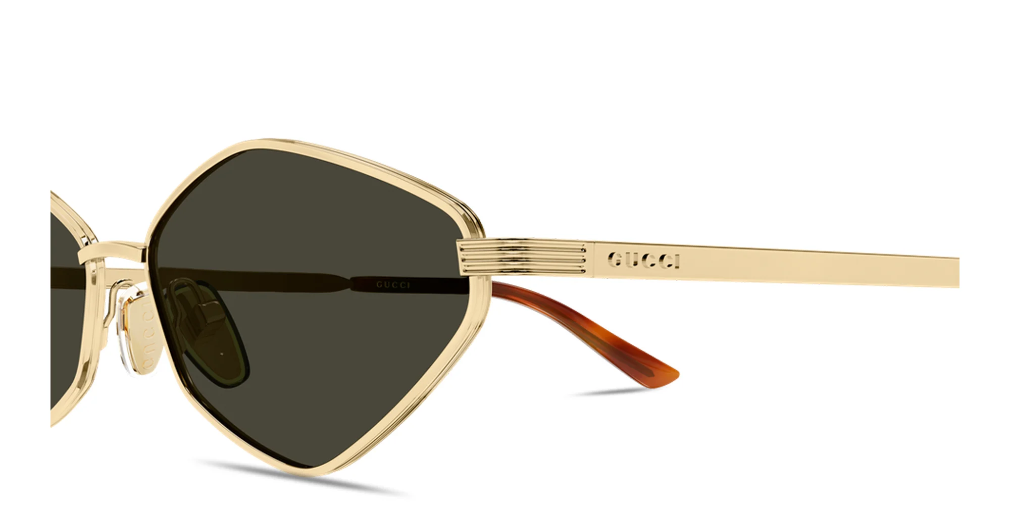 Shop GUCCI Engraved Logo Irregular Sunglasses in Endura Gold online.