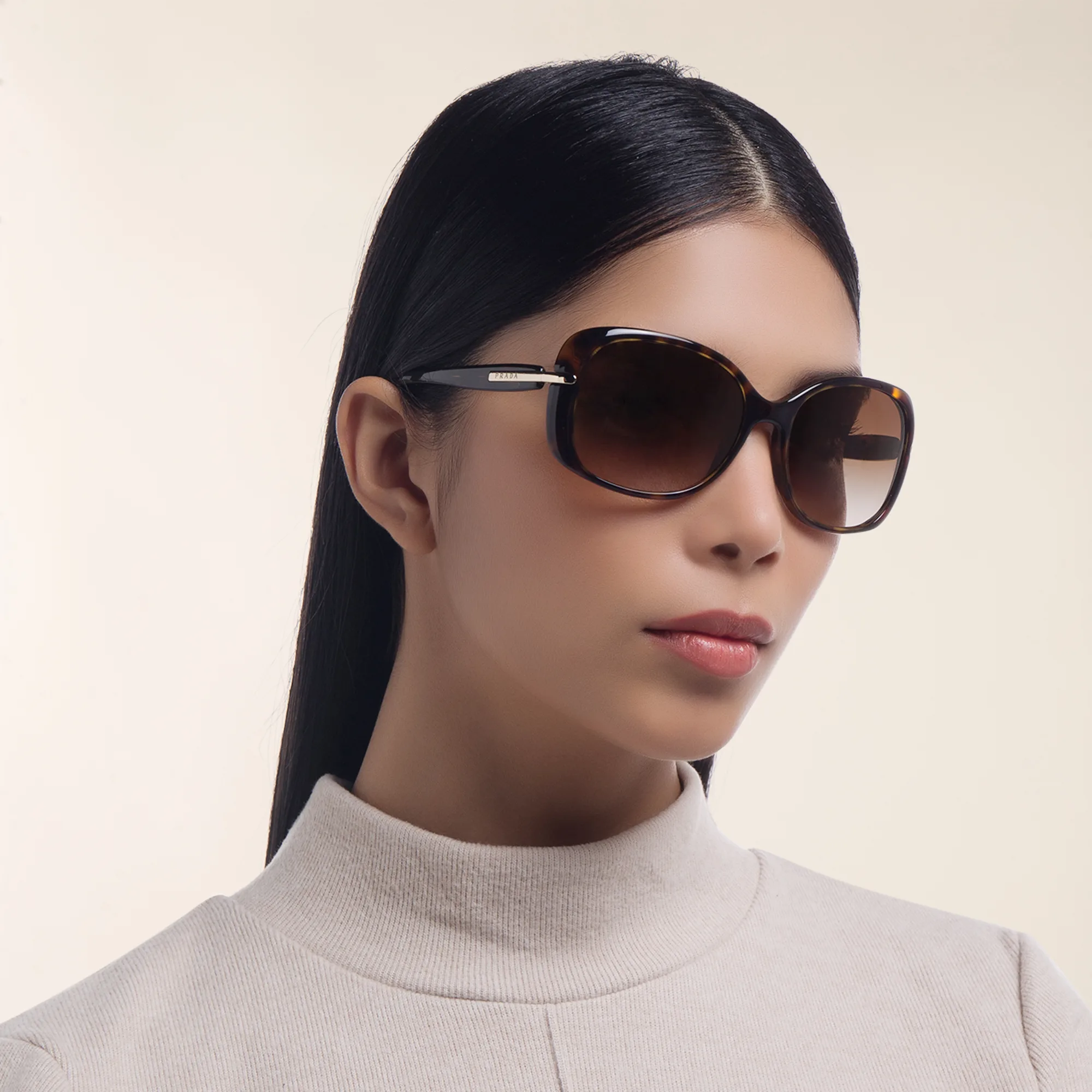 Shop PRADA Rectangle Sunglasses in Brown online.