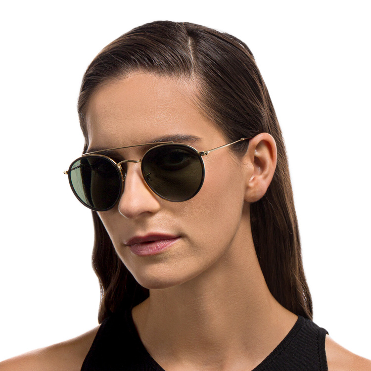 Shop Ray-Ban Round Double Bridge Sunglasses in Gold online.