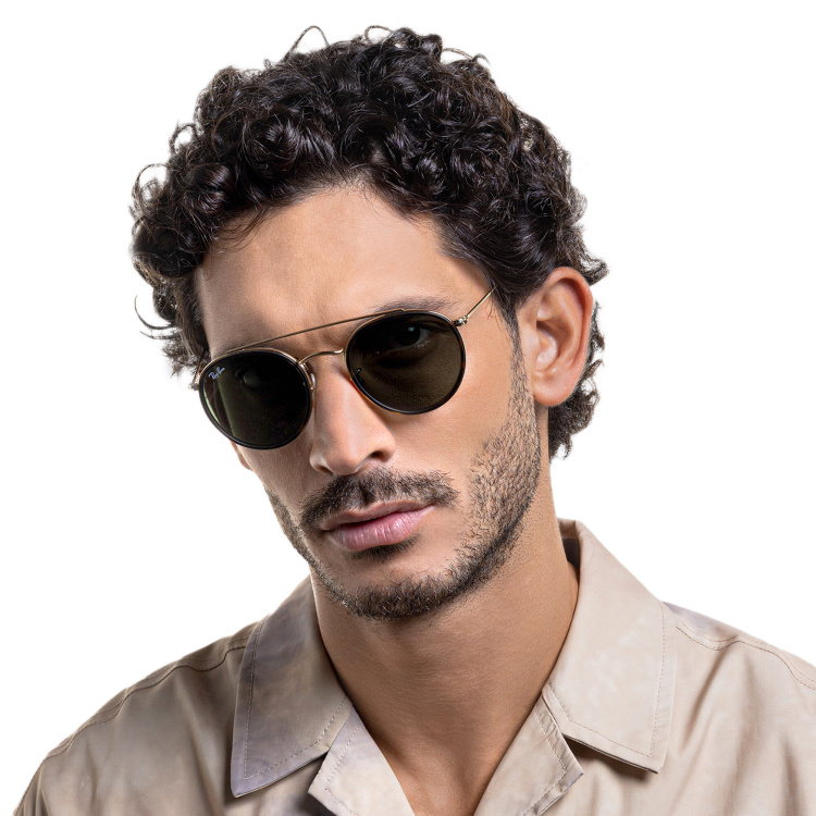 Shop Ray-Ban Round Double Bridge Sunglasses in Gold online.