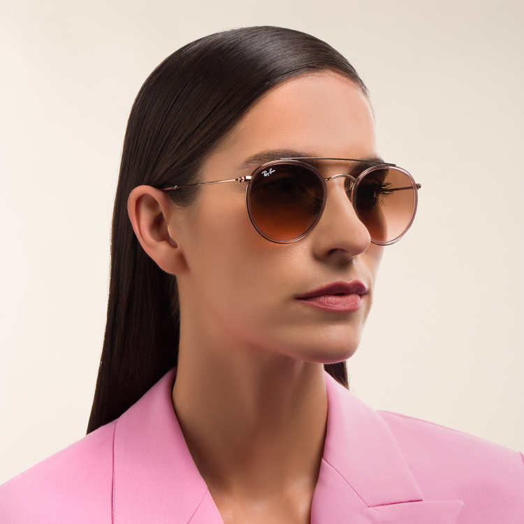 Shop Ray-Ban Round Double Bridge Sunglasses in Copper online.