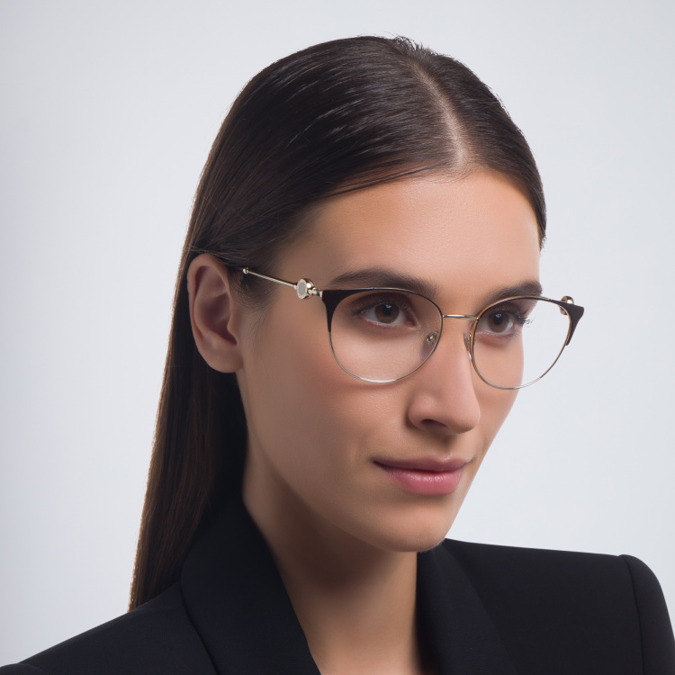 Shop BVLGARI Round Eyeglasses in Brown online.