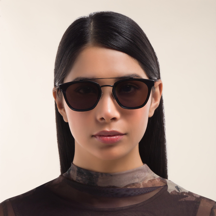 Shop SAINT LAURENT Round Sunglasses in Black online.