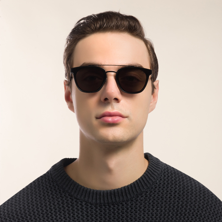 Shop SAINT LAURENT Round Sunglasses in Black online.
