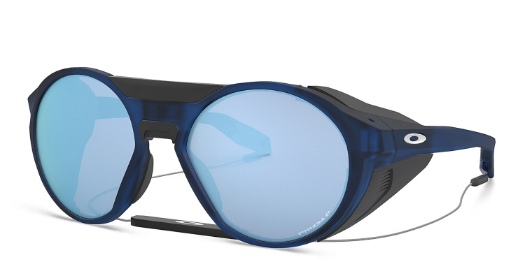 Shop Oakley Clifden Round Sunglasses in Blue online.