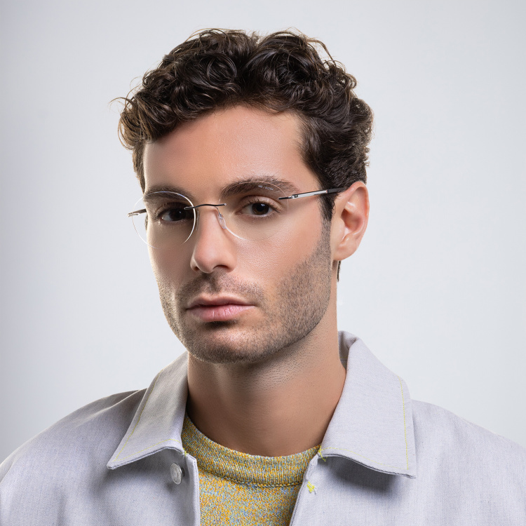 Shop Silhouette Rimless Round Eyeglasses in Silver online.