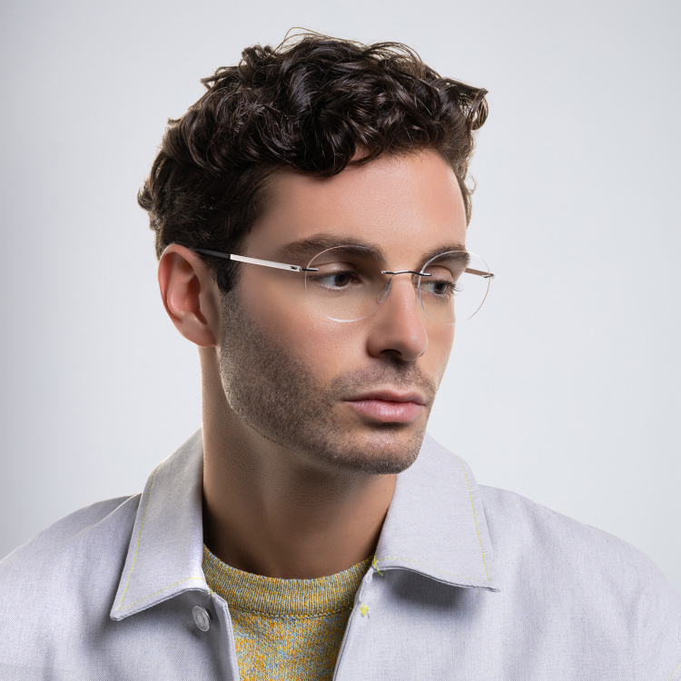 Shop Silhouette Rimless Round Eyeglasses in Silver online.