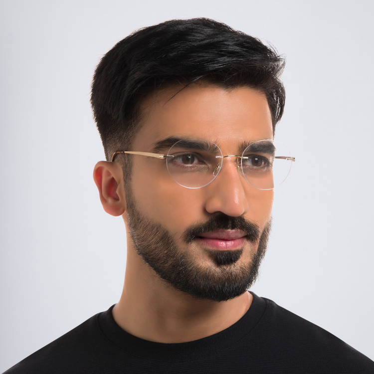 Shop EYE'M Rimless Round Eyeglasses in Gold online.