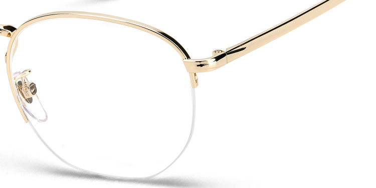 Shop DAVID BECKHAM Half Rim Oval Eyeglasses in Gold online.