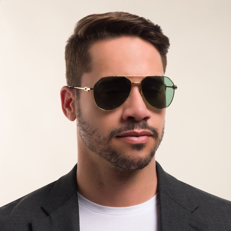 Shop Cartier Signature C de Cartier Pilot Sunglasses in Gold online.