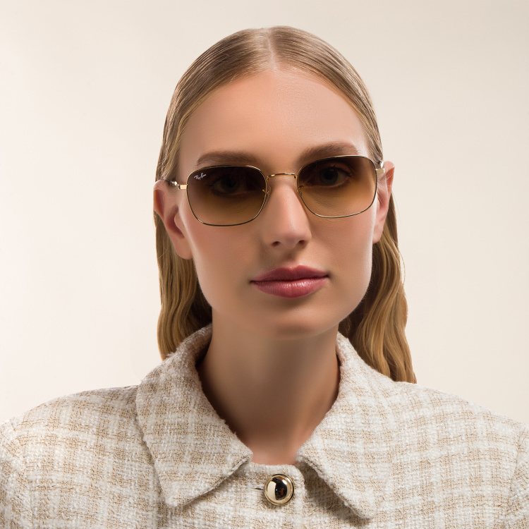 Shop Ray-Ban Unisex Pillow Sunglasses in Gold online.