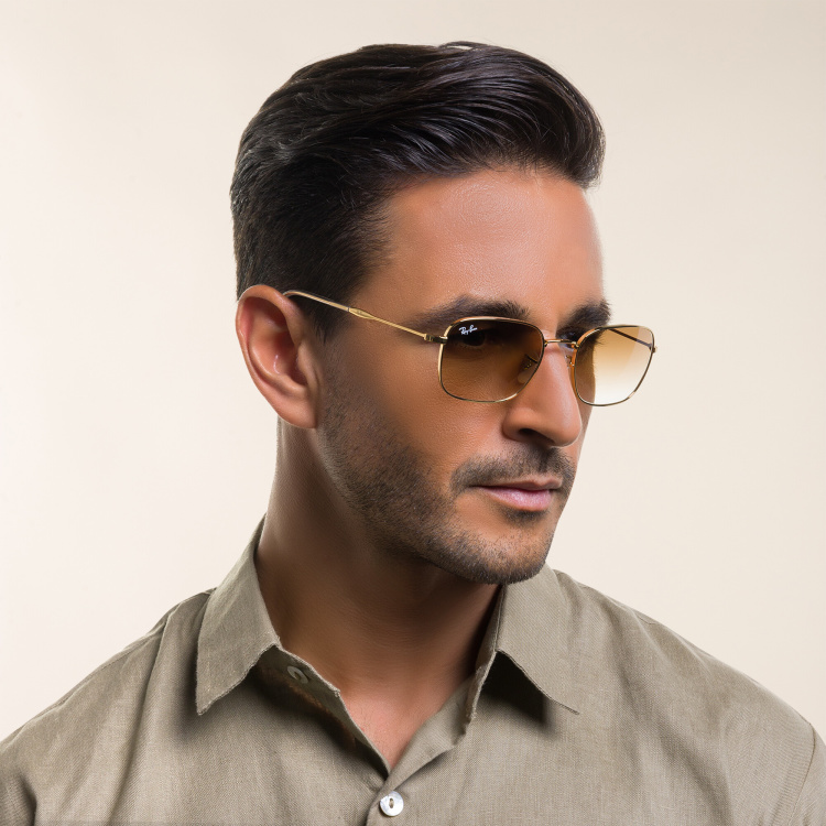 Shop Ray-Ban Unisex Pillow Sunglasses in Gold online.