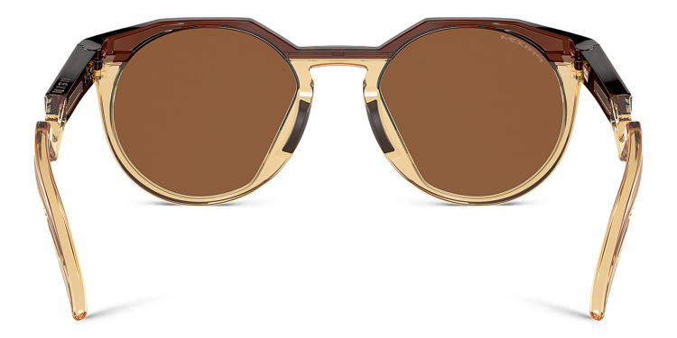 Shop Oakley HSTN Round Sunglasses in Brown online.