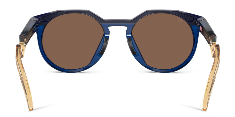Shop Oakley HSTN Round Sunglasses in Blue online.