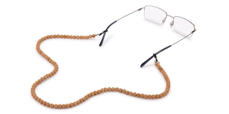 Shop The RICCI DISTRICT Lava Stone Unisex Glasses Chain in Yellow online.