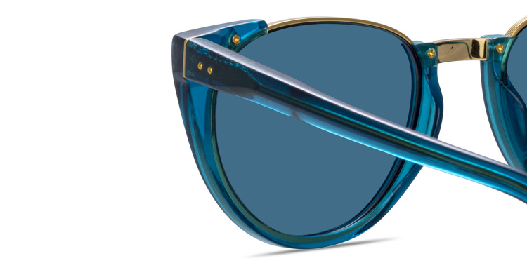 Shop LINDA FARROW Iris Oval Sunglasses in Blue online.