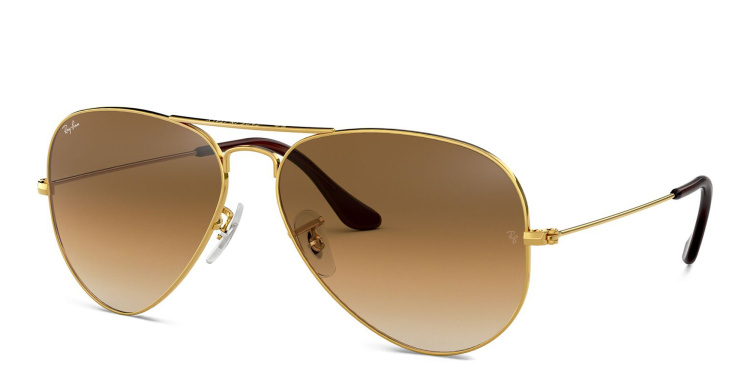 Shop Ray-Ban Pilot Gradient Sunglasses in Gold online.