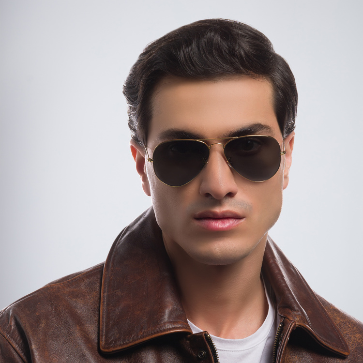 Shop Ray-Ban Unisex Pilot Polarized Sunglasses in Metal in Gold online.