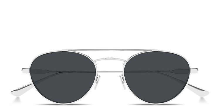 Shop SAINT LAURENT Engraved Logo Round Sunglasses in Silver online.