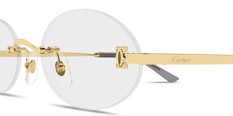 Shop Cartier Double C de Cartier Rimless Oval Eyeglasses in Gold online.