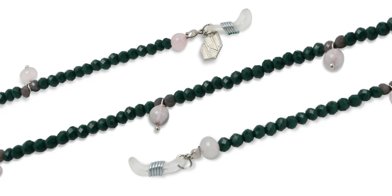 Shop The RICCI DISTRICT Crystals & Rose Quartz Glasses Chain in Green online.