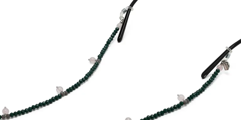 Shop The RICCI DISTRICT Crystals & Rose Quartz Glasses Chain in Green online.