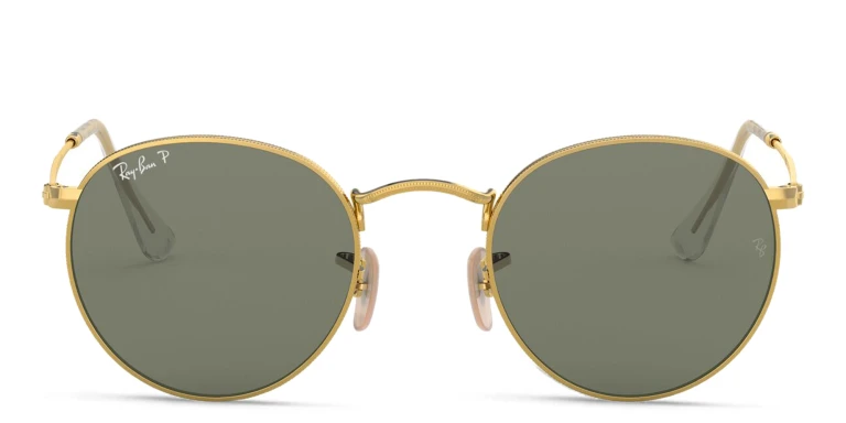 Shop Ray-Ban Round Metal Sunglasses in Gold online.