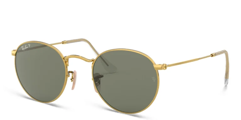 Shop Ray-Ban Round Metal Sunglasses in Gold online.