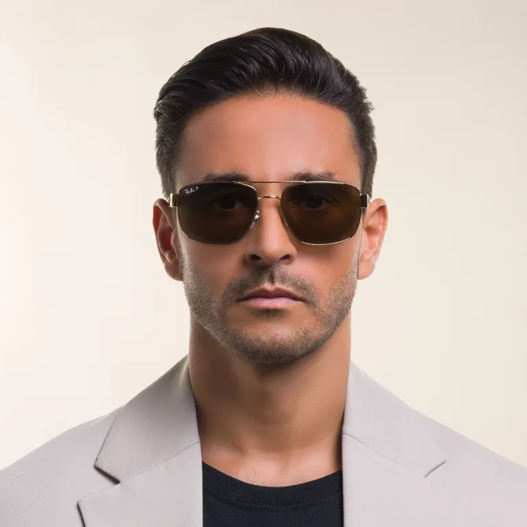 Shop Ray-Ban Irregular Sunglasses in Gold online.