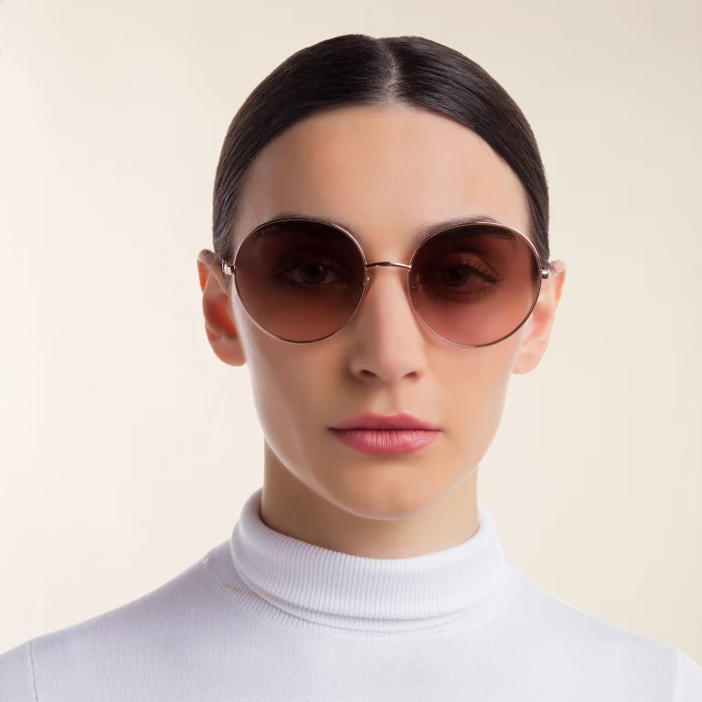 Shop EYE'M Round Sunglasses in Gold online.