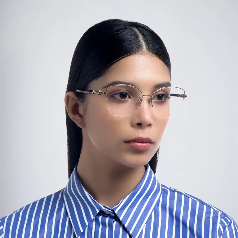 Shop BVLGARI Half Rim Wide Cat Eye Eyeglasses in Gold online.