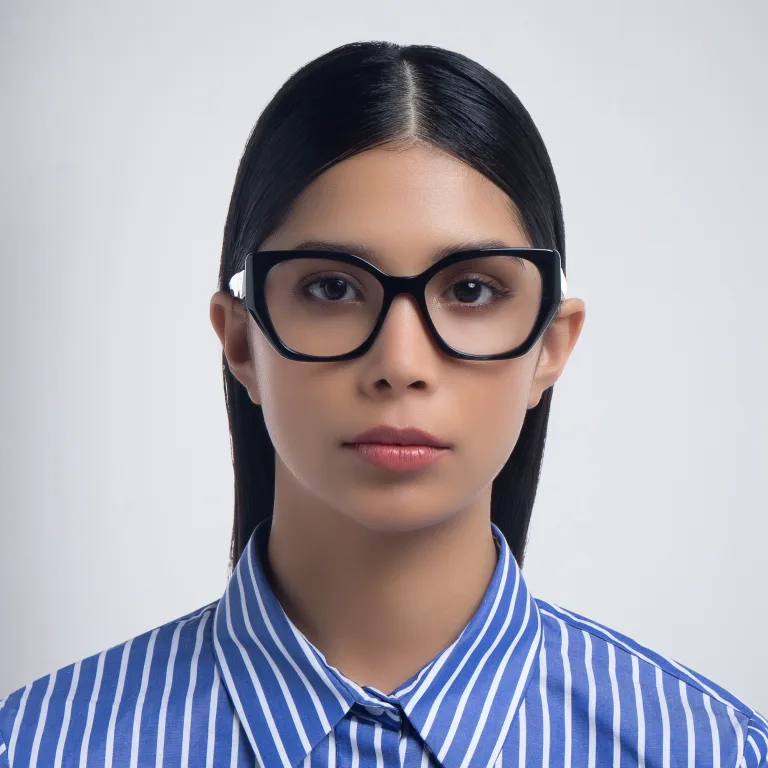 Shop PRADA Irregular Eyeglasses in Black online.