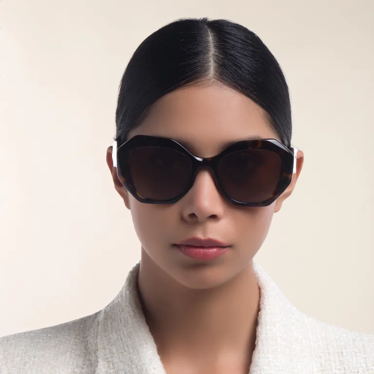 Shop PRADA Irregular Sunglasses in Tortoise online.